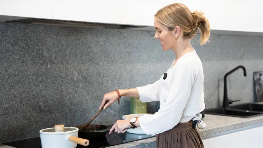 Paige cooking in the kitchen
