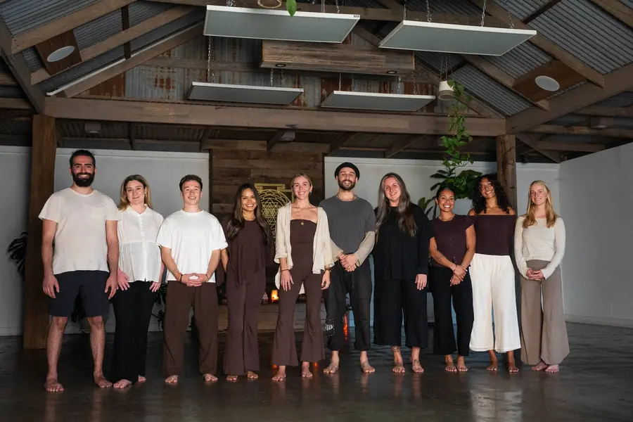The Om Som teaching team standing together in the Berwick studio