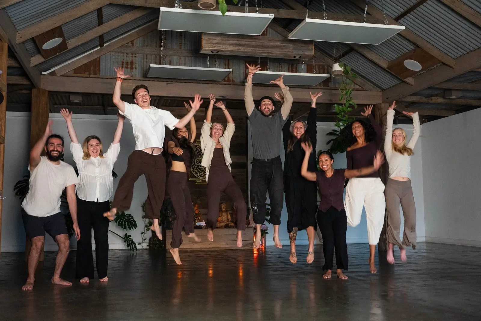 Om Som teachers jumping for joy in the Berwick studio